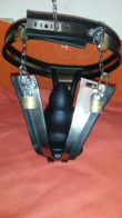 Steel chastity belt modified to fit a 4 inch buttplug